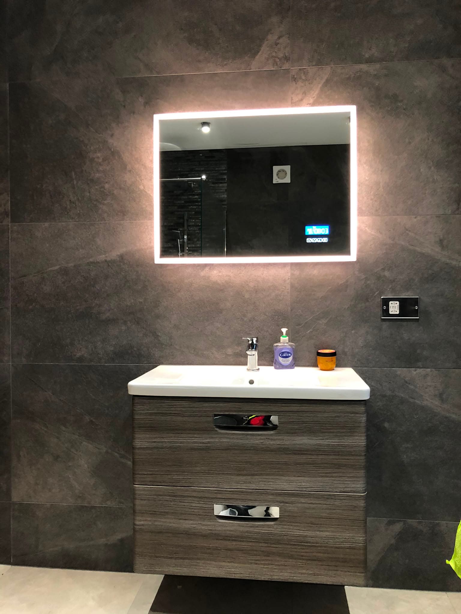 Finished bathroom vanity, mirror and glass shower screen